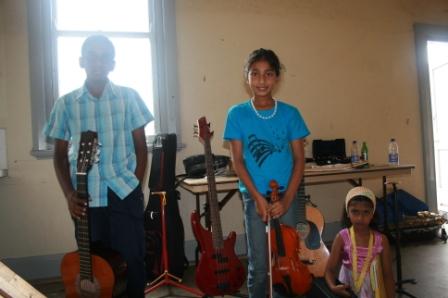 Kishore Logan Guitar Student Sara Gomez Violin Student Eunic Kumar Violin Student